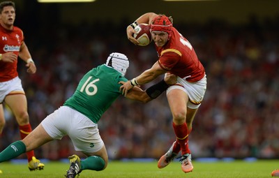 080815 - Wales v Ireland - Dove Men Series 2015 -Tyler Morgan of Wales gets past Rory Best of Ireland