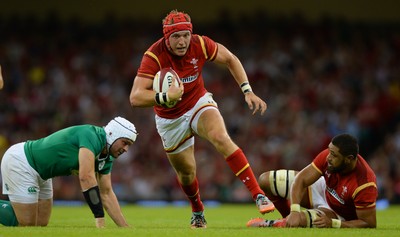 080815 - Wales v Ireland - Dove Men Series 2015 -Tyler Morgan of Wales gets past Rory Best of Ireland