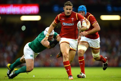 080815 - Wales v Ireland - Dove Men Series 2015 -Hallam Amos of Wales is tackled by Rory Best of Ireland