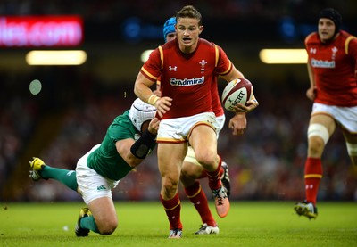 080815 - Wales v Ireland - Dove Men Series 2015 -Hallam Amos of Wales is tackled by Rory Best of Ireland