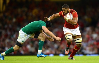 080815 - Wales v Ireland - Dove Men Series 2015 -Taulupe Faletau of Wales is tackled by Tommy O'Donnell of Ireland