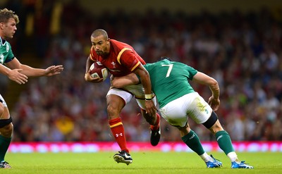 080815 - Wales v Ireland - Dove Men Series 2015 -Eli Walker of Wales is tackled by Tommy O'Donnell of Ireland