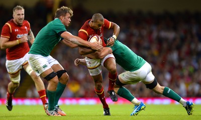 080815 - Wales v Ireland - Dove Men Series 2015 -Eli Walker of Wales is tackled by Jordi Murphy and Tommy O'Donnell of Ireland