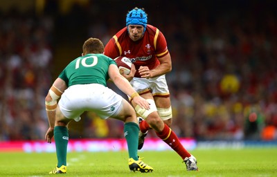 080815 - Wales v Ireland - Dove Men Series 2015 -Justin Tipuric of Wales is tackled by Paddy Jackson of Ireland