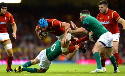 080815 - Wales v Ireland - Dove Men Series 2015 -Justin Tipuric of Wales is tackled by Paddy Jackson of Ireland