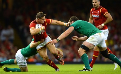 080815 - Wales v Ireland - Dove Men Series 2015 -Hallam Amos of Wales is tackled by Darren Cave and Donnacha Ryan of Ireland