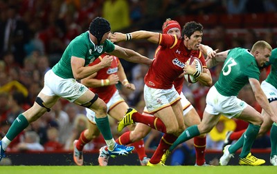 080815 - Wales v Ireland - Dove Men Series 2015 -James Hook of Wales holds off Tommy O'Donnell of Ireland