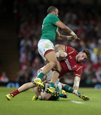 080815 - Wales v Ireland - Dove Mens Series - Alex Cuthbert of Wales is tackled by Felix Jones and Simon Zebo of Ireland