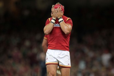 080815 - Wales v Ireland - Dove Mens Series - Dejected Tyler Morgan of Wales with his head in his hands