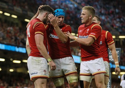 080815 - Wales v Ireland - Dove Mens Series - Alex Cuthbert of Wales is congratulated by Justin Tipuric and Gareth Anscombe of Wales after scoring a try