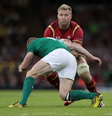 080815 - Wales v Ireland - Dove Mens Series - Ross Moriarty of Wales is tackled by Keith Earls of Ireland