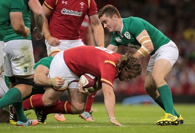 080815 - Wales v Ireland - Dove Mens Series - Kristian Dacey of Wales is tackled