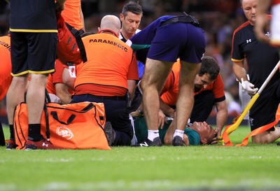 080815 - Wales v Ireland - Dove Men+Care Test - Tommy O'Donnell of Ireland receives treatment for an injury