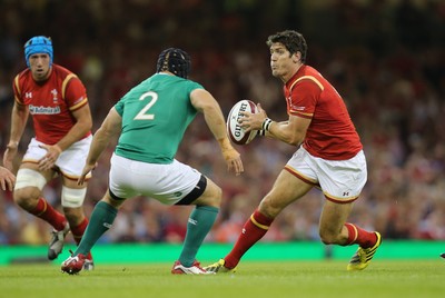 080815 - Wales v Ireland, Dove Men Tests 2015 - James Hook of Wales takes on Richardt Strauss of Ireland 