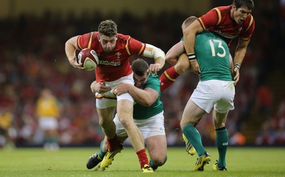 080815 - Wales v Ireland, Dove Men Tests 2015 - Alex Cuthbert of Wales is tackled by Jack McGrath of Ireland 