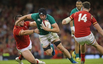 080815 - Wales v Ireland, Dove Men Tests 2015 - Tommy O'Donnell of Ireland  cuts inside Rob Evans of Wales 