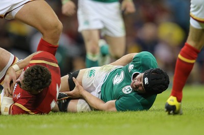 080815 - Wales v Ireland, Dove Men Tests 2015 - Tommy O'Donnell of Ireland goes down in agony with injury after being tackled