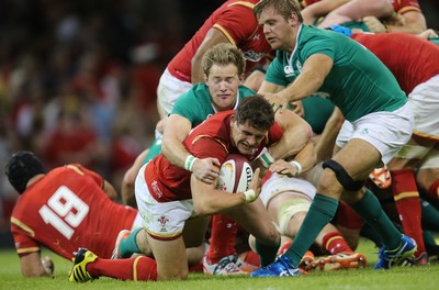 080815 - Wales v Ireland, Dove Men Tests 2015 - Lloyd Williams of Wales is tackled by Kieran Marmion of Ireland  