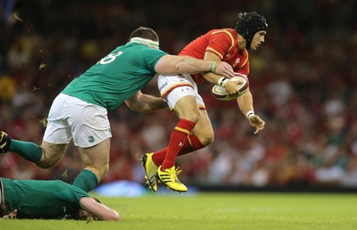 080815 - Wales v Ireland, Dove Men Tests 2015 - Matthew Morgan of Wales tries to break away from Michael Bent of Ireland 