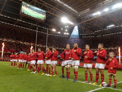 080815 - Wales v Ireland - Dove Men Series - The Wales team remove their jackets to reveal the new World Cup shirt