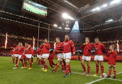 080815 - Wales v Ireland - Dove Men Series - The Wales team remove their jackets to reveal the new World Cup shirt