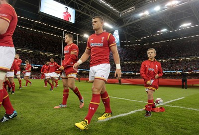 080815 - Wales v Ireland - Dove Men Series - The Wales team remove their jackets to reveal the new World Cup shirt