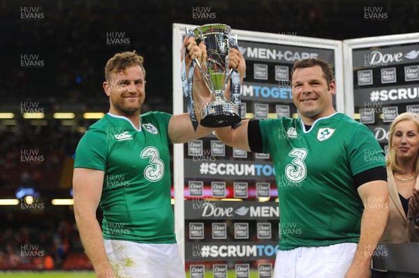 080815 - Wales v Ireland - Dove Men Series 2015 -Jamie Heaslip and Mike Ross of Ireland lift the winners trophy