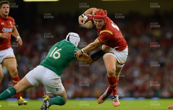 080815 - Wales v Ireland - Dove Men Series 2015 -Tyler Morgan of Wales gets past Rory Best of Ireland