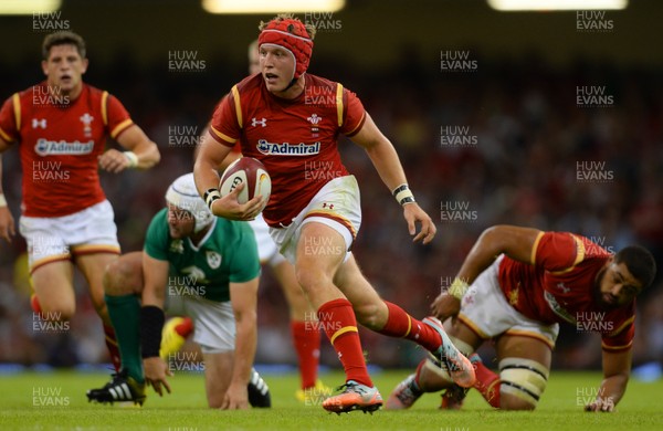 080815 - Wales v Ireland - Dove Men Series 2015 -Tyler Morgan of Wales gets past Rory Best of Ireland