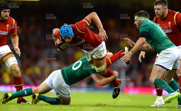 080815 - Wales v Ireland - Dove Men Series 2015 -Justin Tipuric of Wales is tackled by Paddy Jackson of Ireland