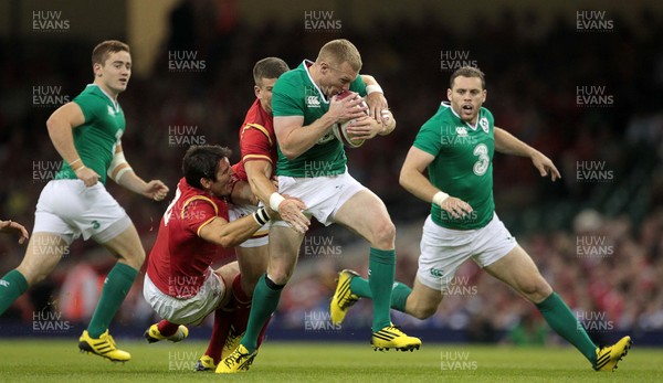 080815 - Wales v Ireland - Dove Mens Series - Keith Earls of Ireland is tackled by James Hook and Scott Williams of Wales