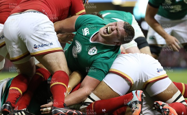 080815 - Wales v Ireland, Dove Men Tests 2015 - Jack McGrath of Ireland shows the pain as he is trapped in a ruck