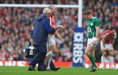12.03.11 - Wales v Ireland - RBS Six Nations 2011 - Craig Mitchell of Wales leaves the field with an injury. 