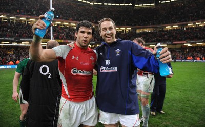 12.03.11 - Wales v Ireland - RBS Six Nations 2011 - Mike Phillips and Ryan Jones of Wales celebrate at the end of the game after winning their 50th caps. 