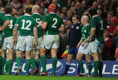 12.03.11 - Wales v Ireland - RBS Six Nations 2011 - Ireland players confront referee Jonathan Kaplan and Touch judge Petter Allan after Mike Phillips of Wales scores try. 