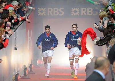 12.03.11 - Wales v Ireland - RBS Six Nations 2011 - Mike Phillips and Ryan Jones of Wales run out for their 50th caps. 
