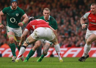 12.03.11 Wales v Ireland - RBS 6 Nations Championship-  Ireland's Keith Earls takes on Wales' Ryan Jones.  