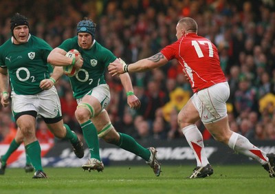 12.03.11 Wales v Ireland - RBS 6 Nations Championship-  Ireland's Sean O'Brien takes on Wales' John Yapp. 