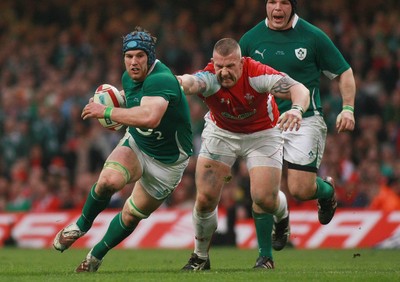 12.03.11 Wales v Ireland - RBS 6 Nations Championship-  Ireland's Sean O'Brien takes on Wales' John Yapp. 