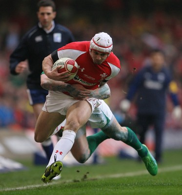 12.03.11 Wales v Ireland ... Wales Leigh Halfpenny is tackled by Ireland's Keith Earls. 