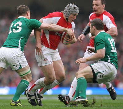 12.03.11 Wales v Ireland ... Wales Jonathan Davies is tackled by Ireland's Brian O'Driscoll. 