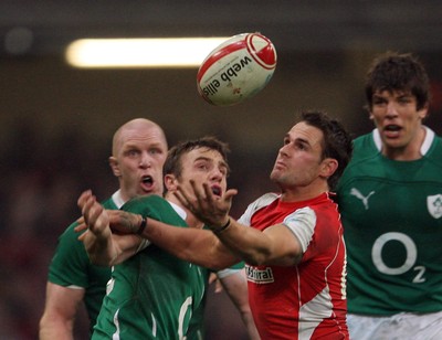 12.03.11 Wales v Ireland ... Wales Lee Byrne competes with Tommy Bowe. 