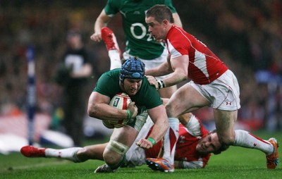 12.03.11 Wales v Ireland ... Ireland's Sean O'Brien is brought down by Lee Byrne. 