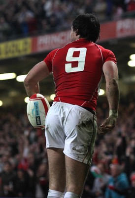 12.03.11... Wales v Ireland, RBS 6 Nations -  Wales' Mike Phillips gets up with the ball after scoring try 