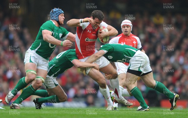 12.03.11 - Wales v Ireland - RBS Six Nations 2011 - Jamie Roberts of Wales is stopped. 