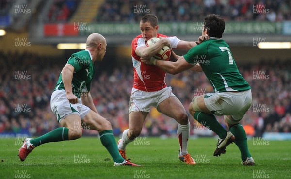 12.03.11 - Wales v Ireland - RBS Six Nations 2011 - Shane Williams of Wales is tackled by David Wallace of Ireland. 