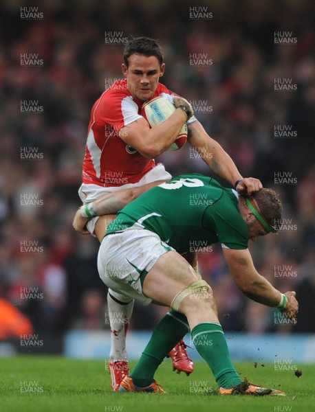 12.03.11 - Wales v Ireland - RBS Six Nations 2011 - Lee Byrne of Wales is tackled by Jamie Heaslip of Ireland. 