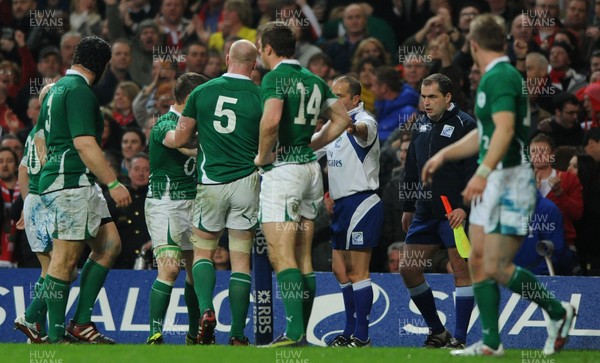 12.03.11 - Wales v Ireland - RBS Six Nations 2011 - Ireland players confront referee Jonathan Kaplan and Touch judge Petter Allan after Mike Phillips of Wales scores try. 