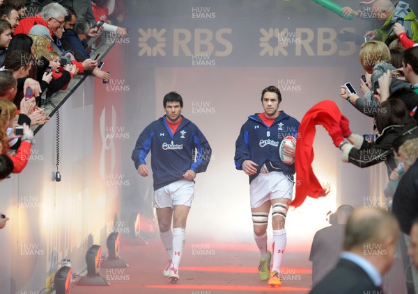 12.03.11 - Wales v Ireland - RBS Six Nations 2011 - Mike Phillips and Ryan Jones of Wales run out for their 50th caps. 