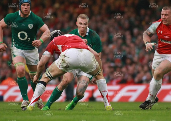12.03.11 Wales v Ireland - RBS 6 Nations Championship-  Ireland's Keith Earls takes on Wales' Ryan Jones.  